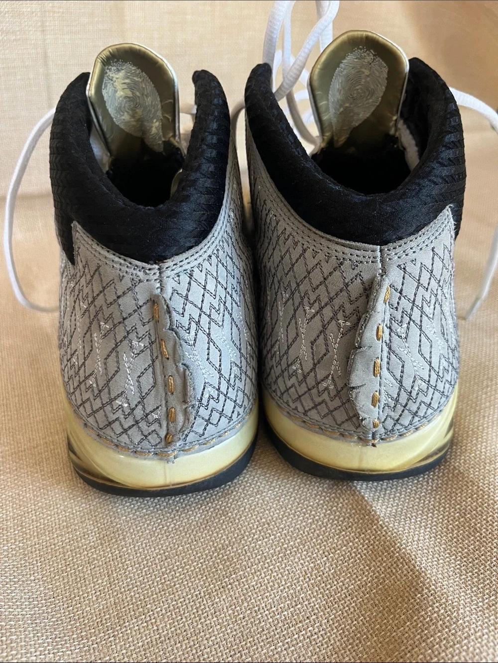 Nike Air Jordan 23  mid Top Sneakers in White, Gray & Gold